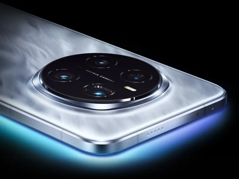 Close-up shot of Honor Magic 8 rear camera module featuring a circular matrix camera setup with four lenses and a sleek metallic frame illuminated by blue ambient light.